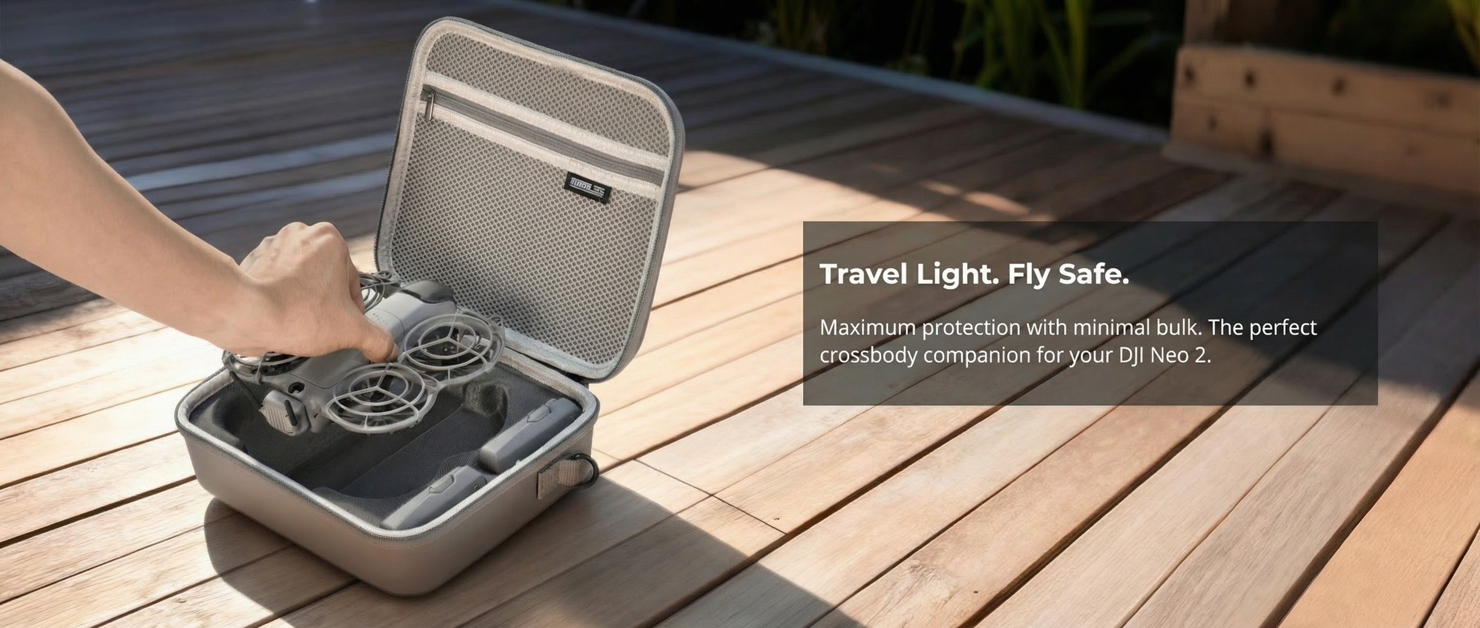 A user quickly retrieving the drone from the STARTRC DJI Neo 2 compact travel case, showcasing the 1:1 precise fit interior that prevents gear wobble.