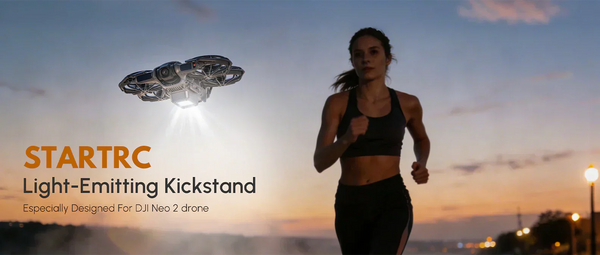 A bare DJI Neo 2 drone flying at golden hour with the STARTRC light-emitting landing gear, projecting a bright white LED beam downwards to ensure visibility and safe navigation for pilots during night flights. A creator is visible in the background.