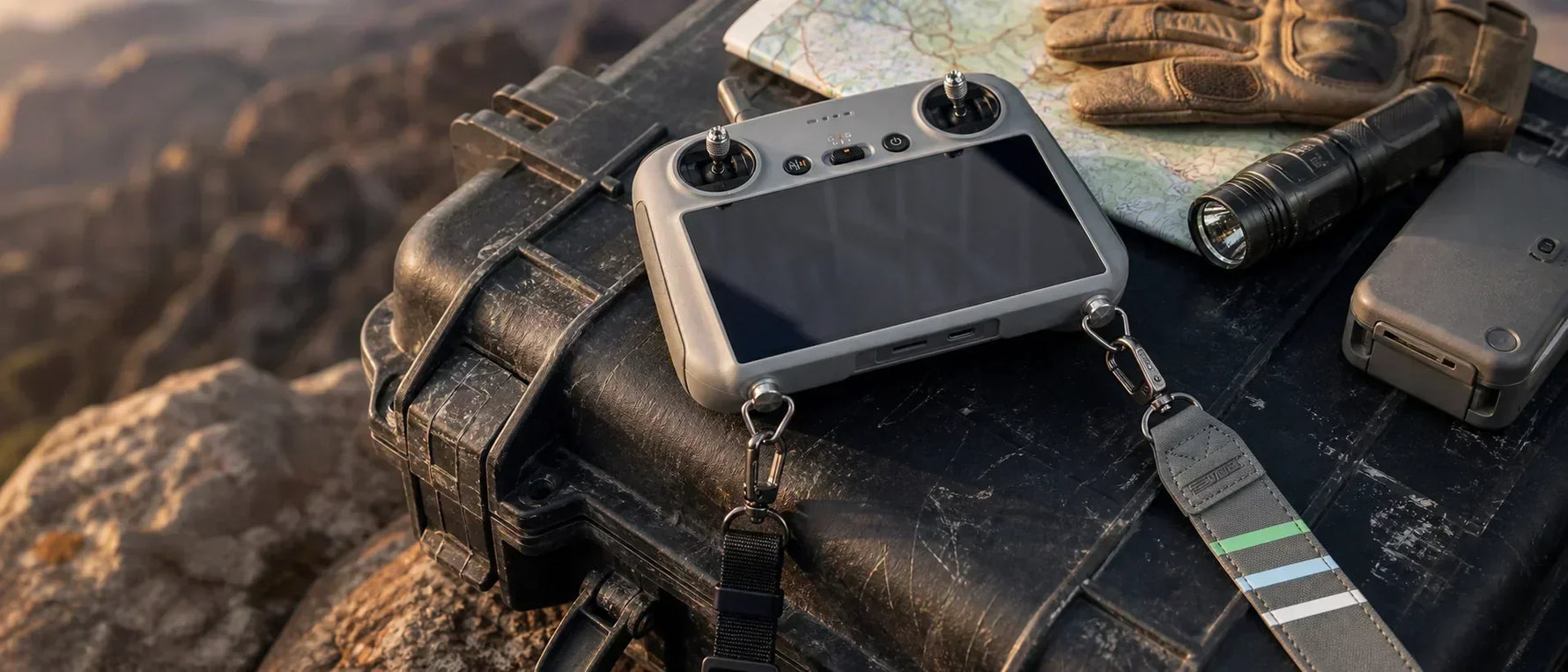 STARTRC neck strap attached to a DJI RC 2 controller for hands-free drone field setup