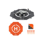 Drone with a landing pad and additional components on a white background