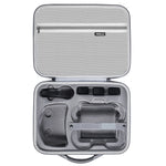 Detailed internal storage layout of the DJI Avata 2 accessory bag with custom-molded slots for Goggles 3 and three flight batteries.
