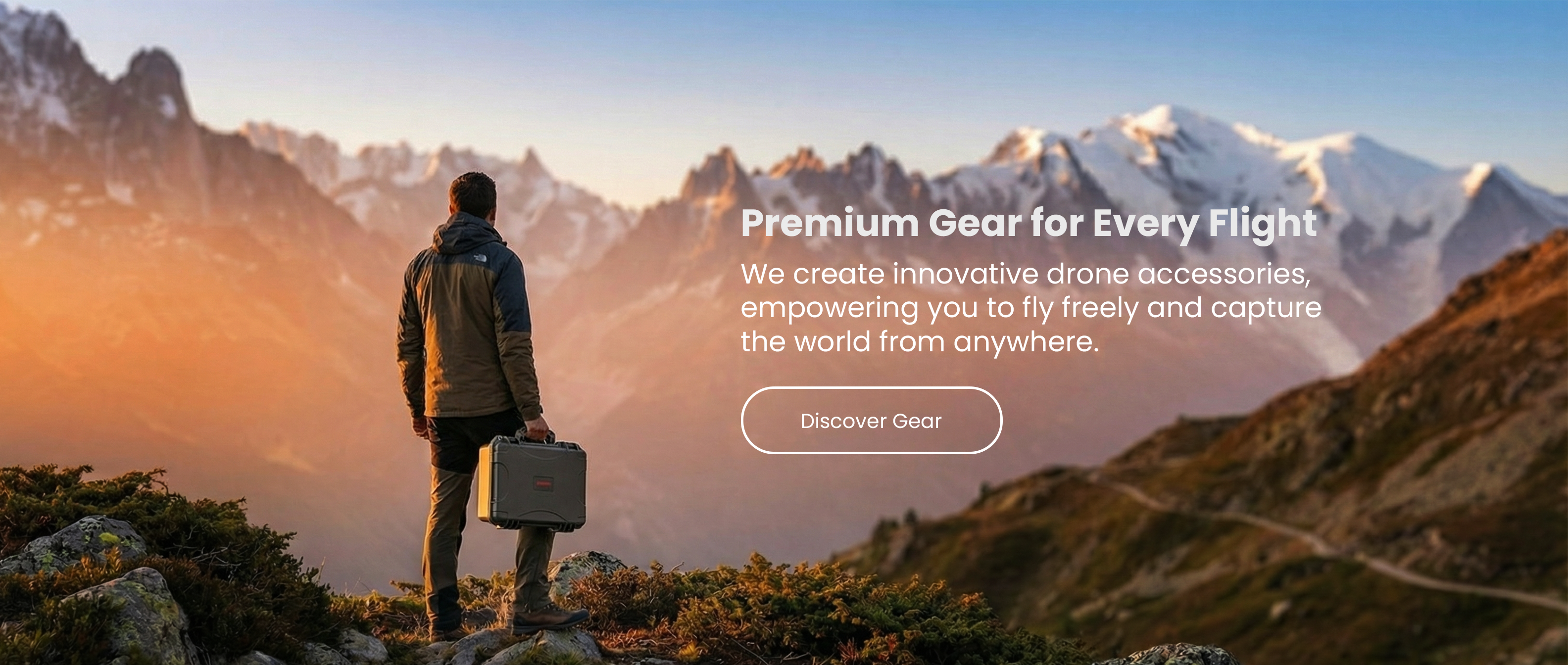 A drone enthusiast standing on a mountain peak holding a DJI hard case, representing the best DJI gear and innovative drone accessories for professional outdoor photography.