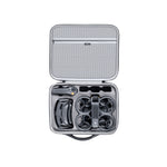 Inside the STARTRC DJI Avata 2 carrying case showing organized storage for the Goggles 3, RC Motion 3, and drone batteries.