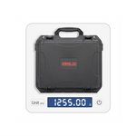 The STARTRC DJI Lito waterproof hard case on a digital scale, displaying a net weight of 1265g. A durable protective case with a shoulder strap for easy outdoor carrying.