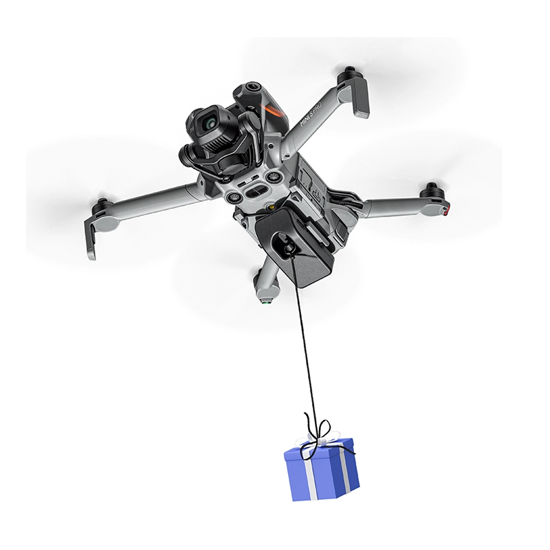 DJI Mini 5 Pro drone equipped with STARTRC 2-in-1 photosensitive airdrop system delivering a blue gift box.