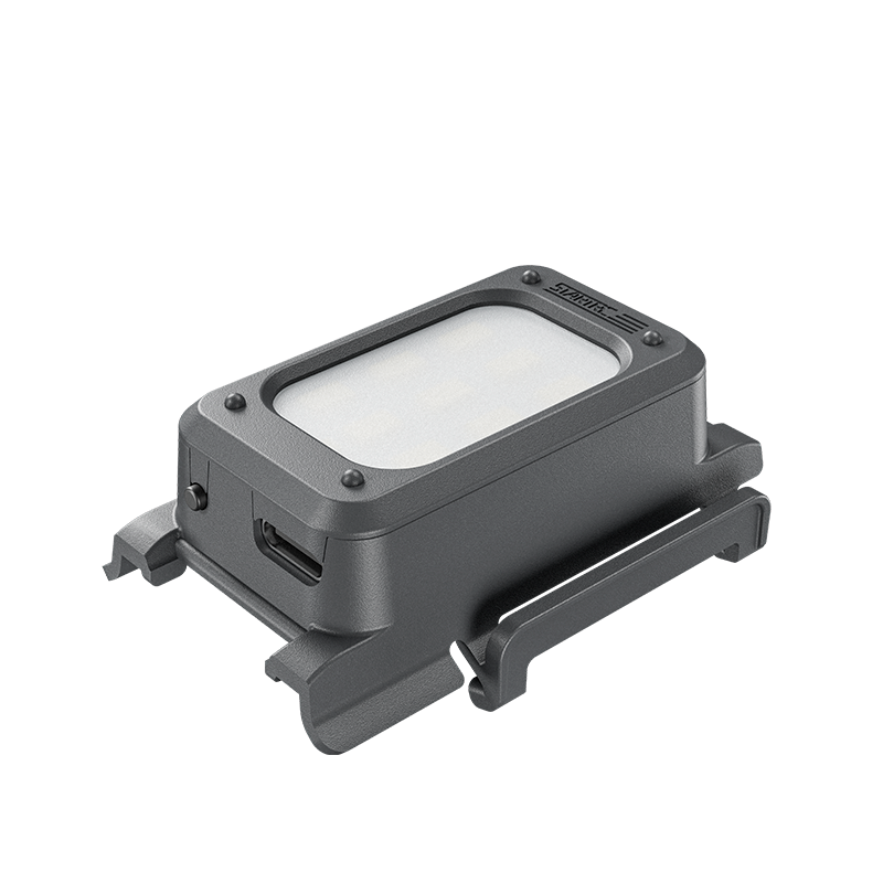 Close-up of the ultra-lightweight 21g LED fill light accessory, exclusively designed to fit the DJI Neo 2 drone perfectly
