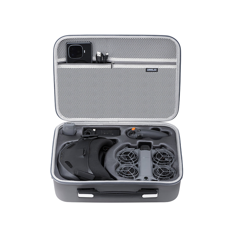 Open STARTRC DJI Neo 2 carrying case revealing the precise Lycra interior holding the drone, Goggles N3, and DJI RC Motion 3.