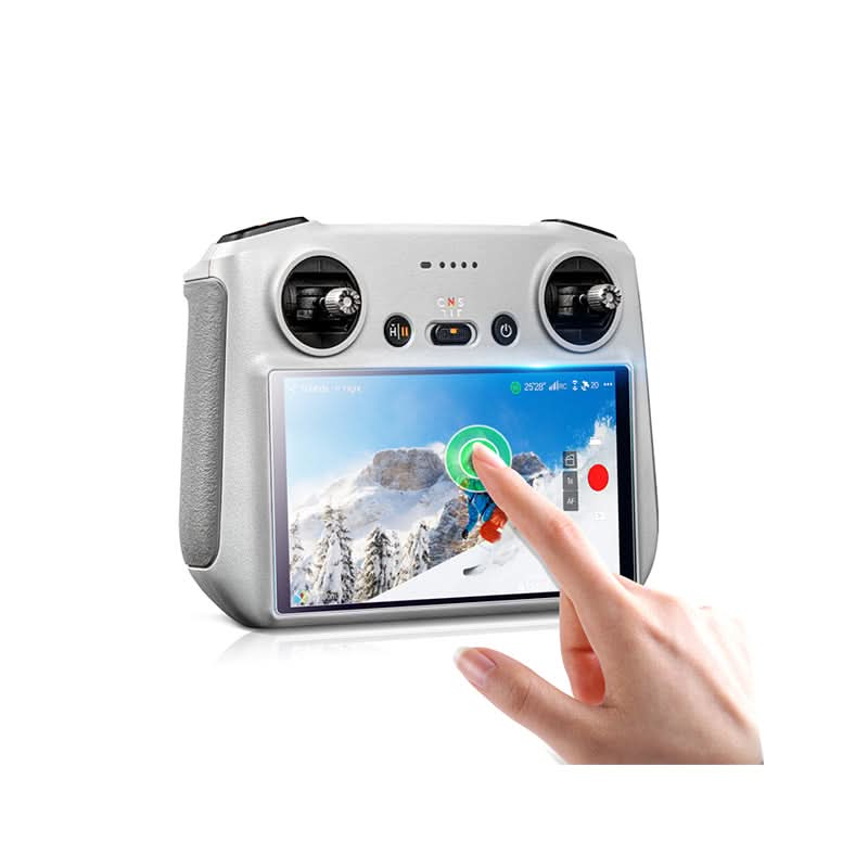 A pilot effortlessly swiping the DJI RC 2 remote screen, demonstrating the lag-free touch sensitivity and anti-smudge fingerprint-repelling finish.