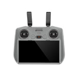 The STARTRC grey silicone protective cover installed on a DJI RC 2 remote controller, providing full drop-proof and anti-slip protection for the screen and body.