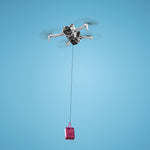 Aerial view of a camera drone delivering a small payload mid-air, perfect for dropping wedding rings, fishing gear, or emergency supplies.