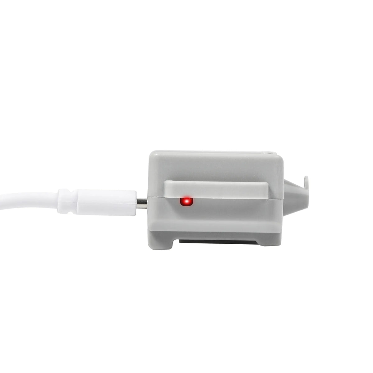 Drone delivery device plugged in for quick USB charging, featuring a red LED indicator to ensure your airdrop system is always flight-ready.