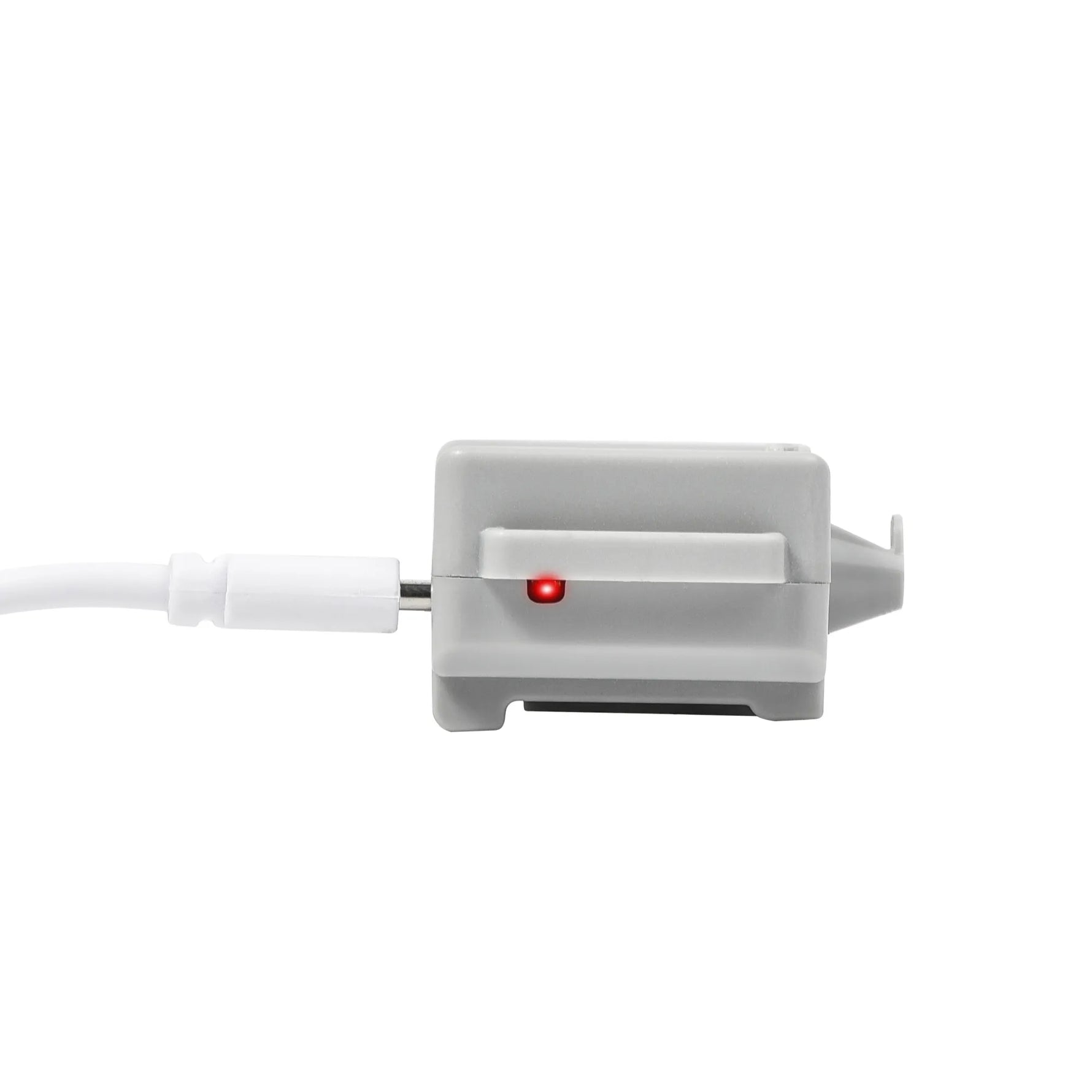 Drone delivery device plugged in for quick USB charging, featuring a red LED indicator to ensure your airdrop system is always flight-ready.