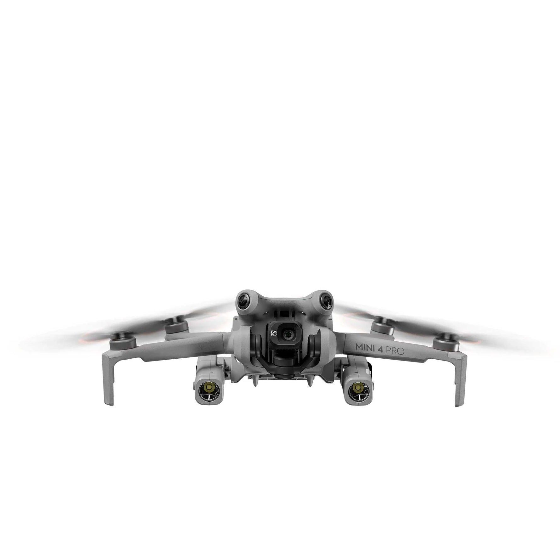 Front profile of a compact camera drone airborne with bright dual-side LED lights, enhancing visibility for travel creators and outdoor enthusiasts.