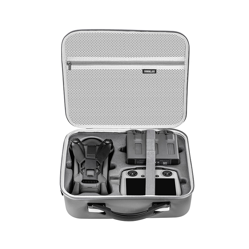 Top-down view of the drone storage bag interior, displaying the precision-molded slots perfectly tailored for the Fly More Combo accessories.