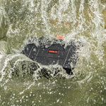 The STARTRC DJI Avata 2 case undergoing a splash test to demonstrate its IP67 waterproof rating, keeping high-value drone gear dry in extreme environments.
