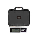 The STARTRC DJI Avata 2 hard case on a digital scale, proving its lightweight design that doesn't compromise on rugged, shock-absorbing protection.