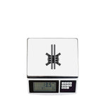 The STARTRC DJI Avata 2 foldable landing gear on a digital scale, highlighting its ultra-lightweight 13.5g design.