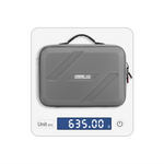 The STARTRC DJI Lito travel bag on a digital scale, showing a lightweight net weight of 635g. Perfect for traveling without the bulk.
