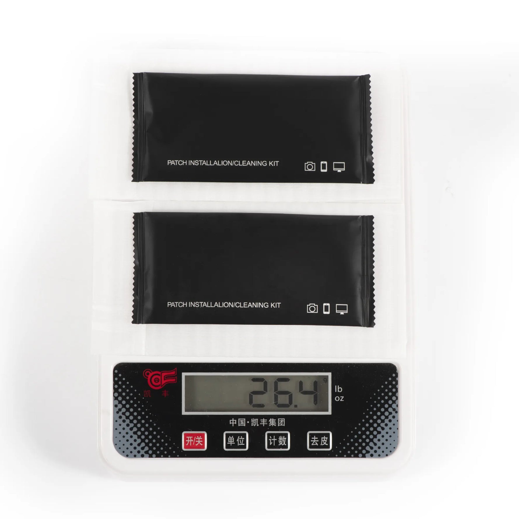 Two pieces of the STARTRC DJI RC screen protectors on a digital scale, proving the lightweight design that adds zero burden to outdoor flight operations.