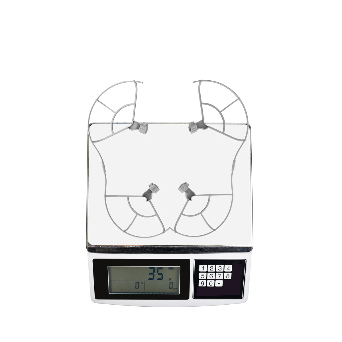 Digital scale displaying the lightweight design of the drone propeller protector, ensuring no negative impact on your flight dynamics and maneuverability.