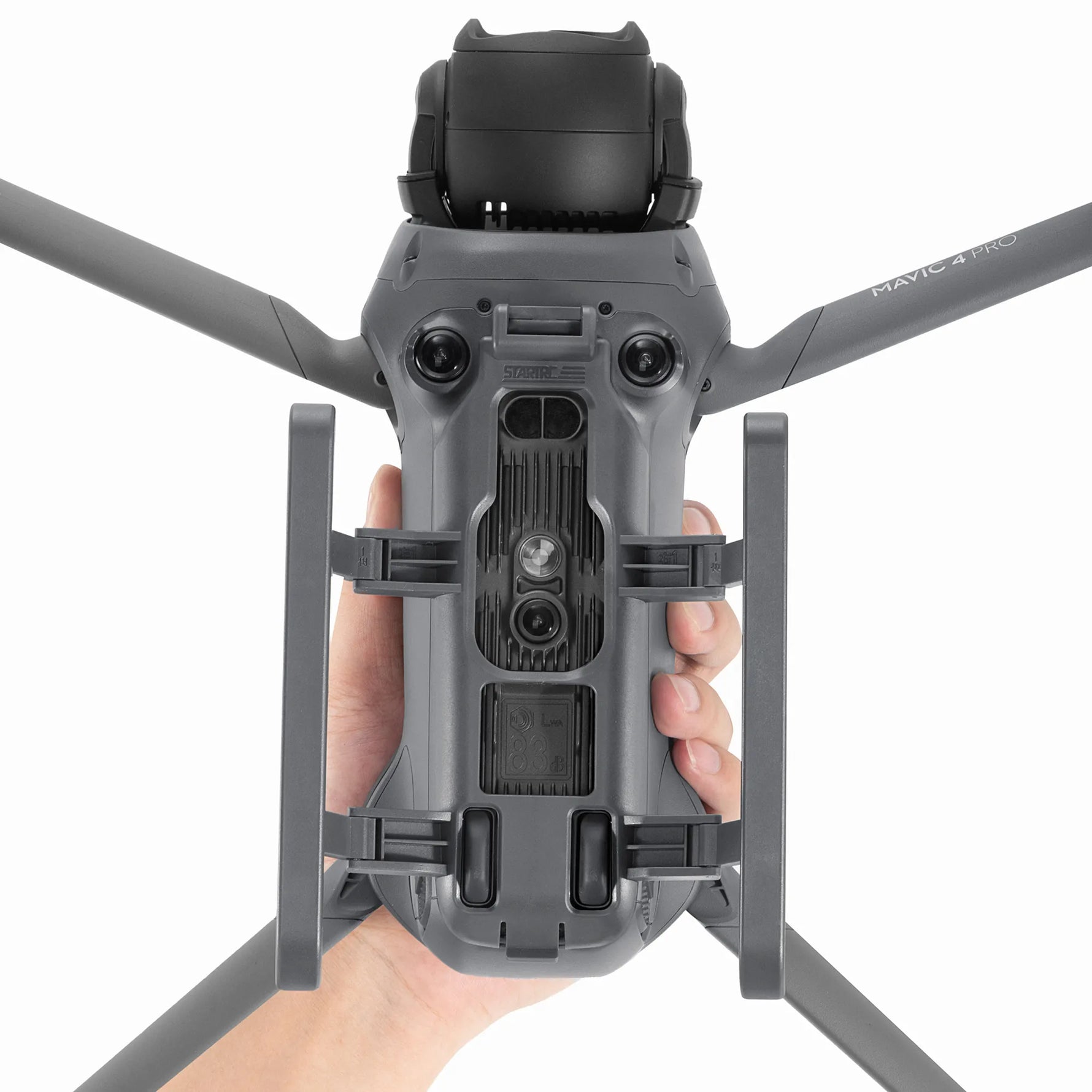 Bottom view of the DJI Mavic 4 Pro showing the secure installation of the precision-engineered landing gear accessory.