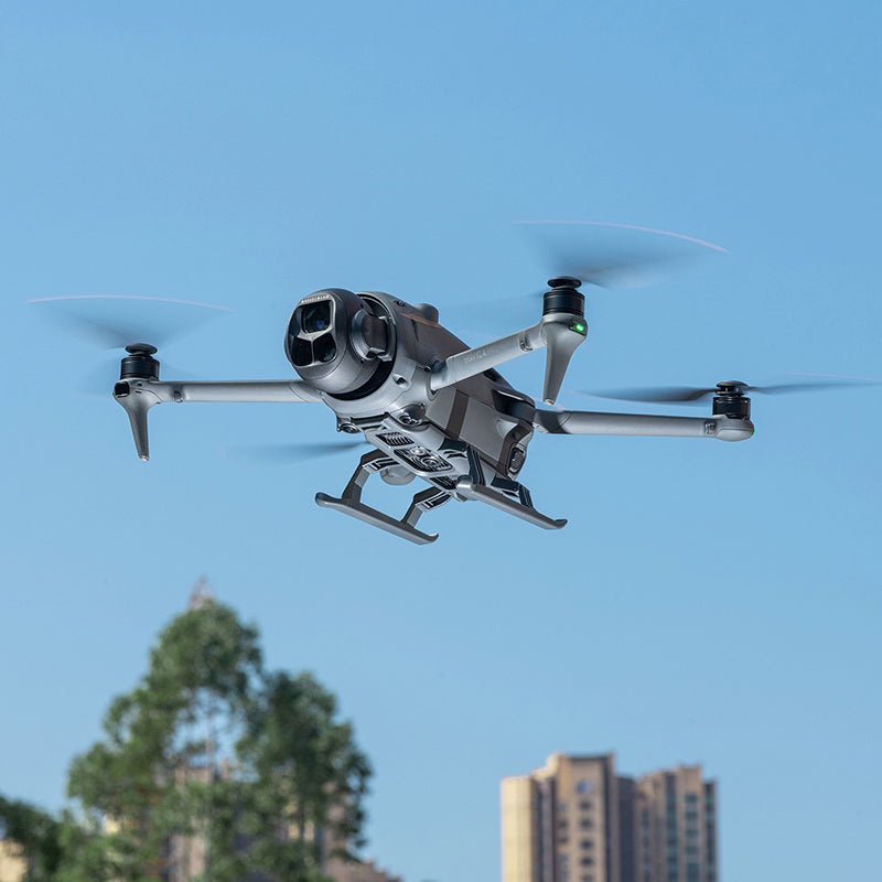 Aerial view of the DJI drone flying smoothly outdoors, demonstrating that the lightweight landing gear does not affect agility.