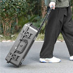 Content creator effortlessly pulling the rolling drone trolley outdoors, the perfect travel solution for carrying full aerial photography gear without fatigue.