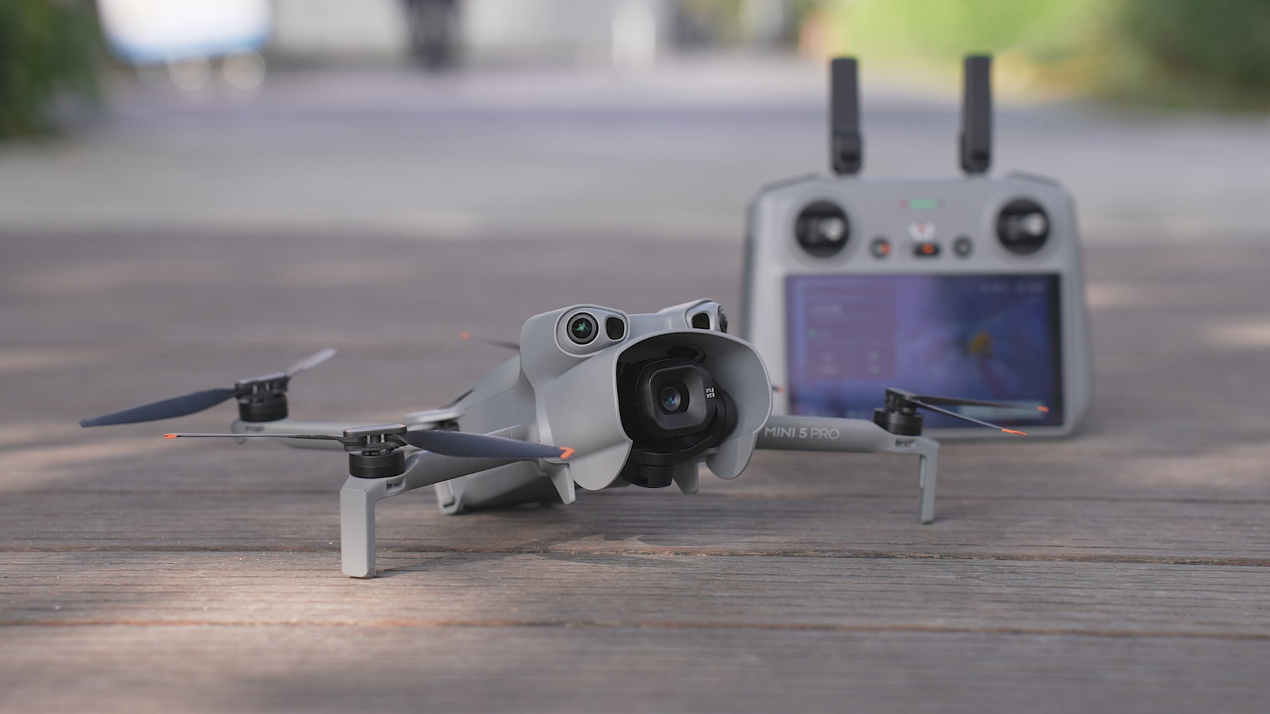 Close-up of the DJI Mini 5 Pro with the sunshade mounted, showing its integrated look that blends seamlessly with the drone's design.