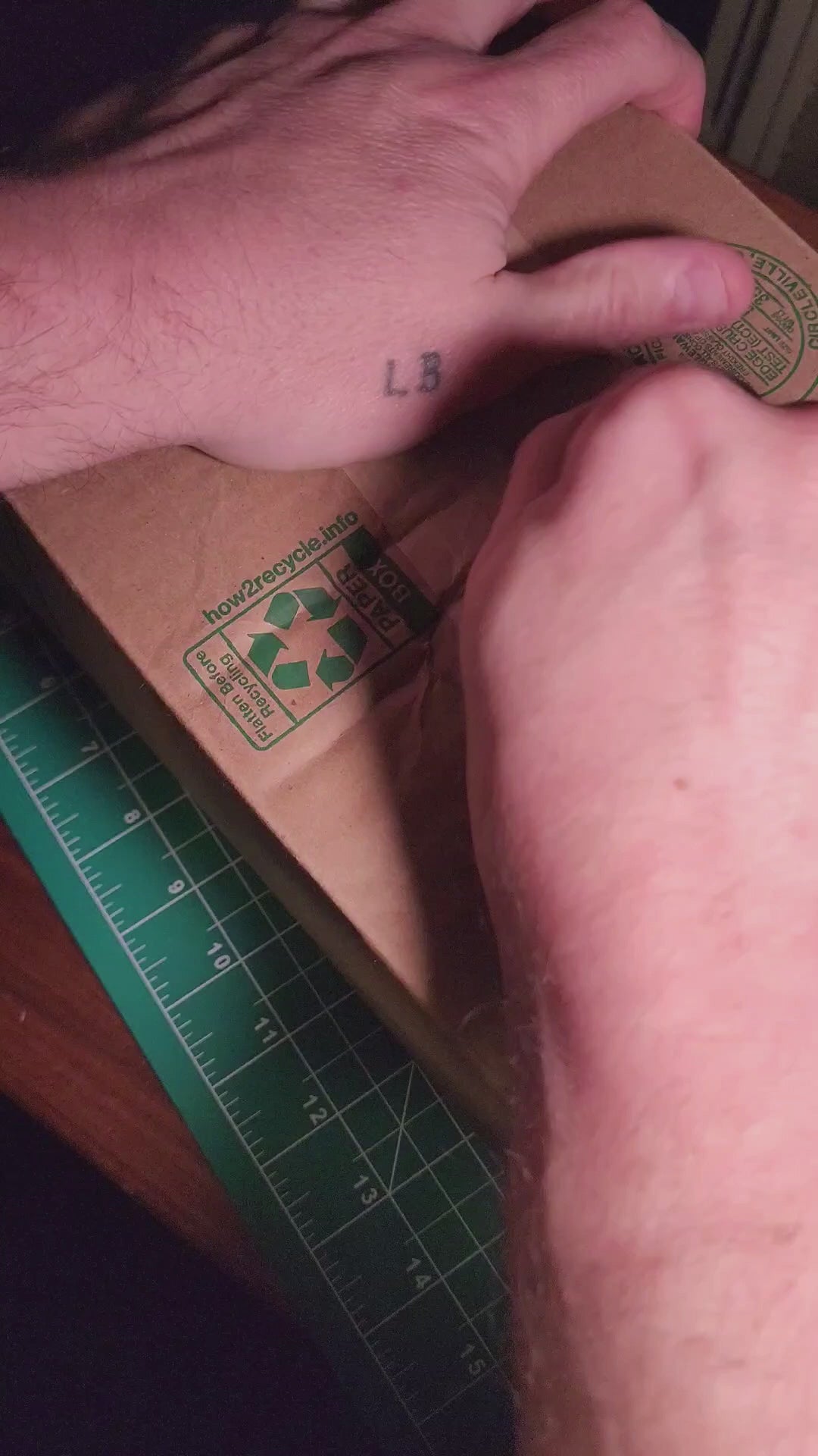 Video tutorial thumbnail demonstrating the step-by-step installation of the multipurpose airdrop accessory onto the camera drone.
