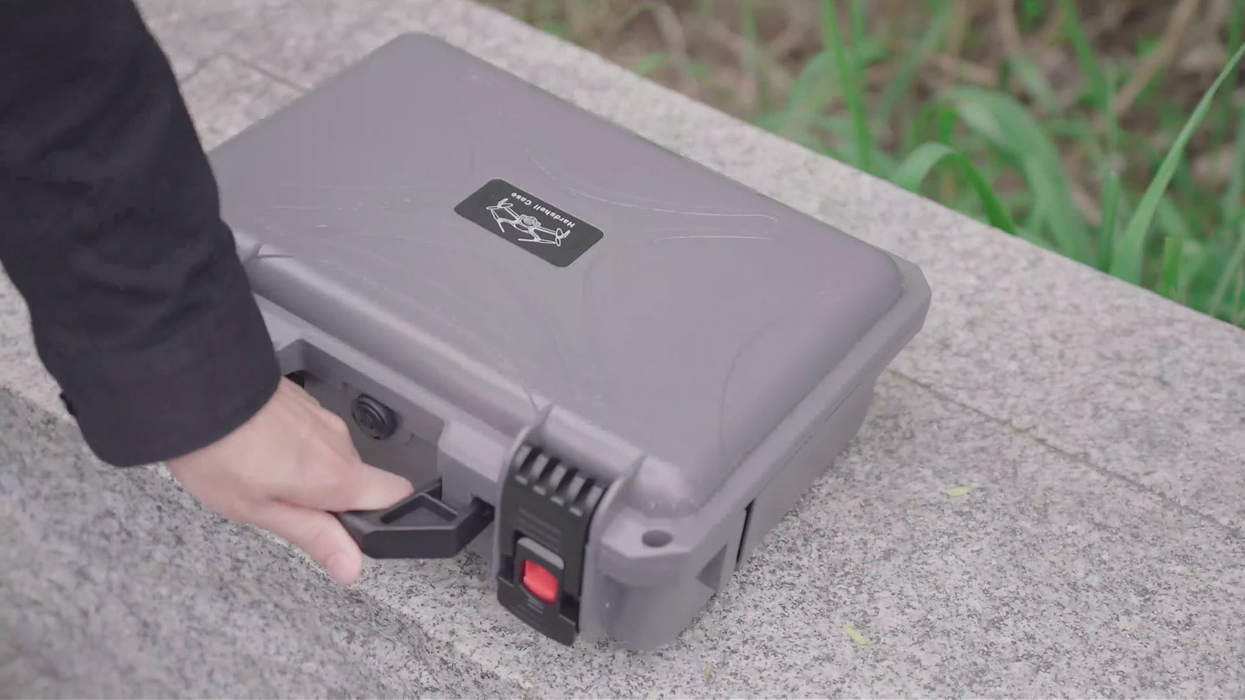 Video thumbnail demonstrating a drone pilot effortlessly carrying the high-capacity double-layer hard case using the ergonomic handle on an outdoor trail.