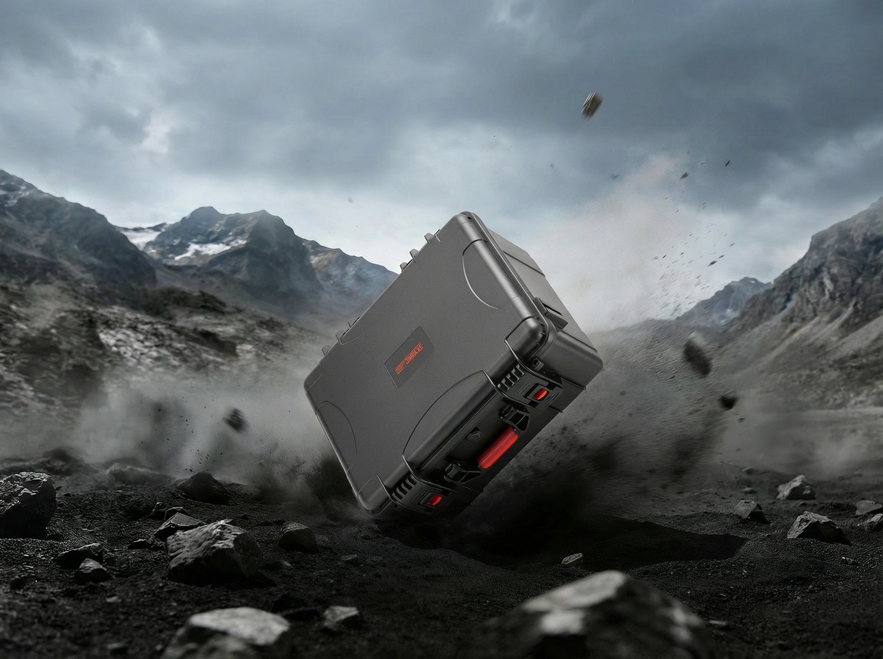 A rugged DJI waterproof hard case tumbling through rocky terrain to demonstrate professional impact defense and protection for drones and essential flight gear.