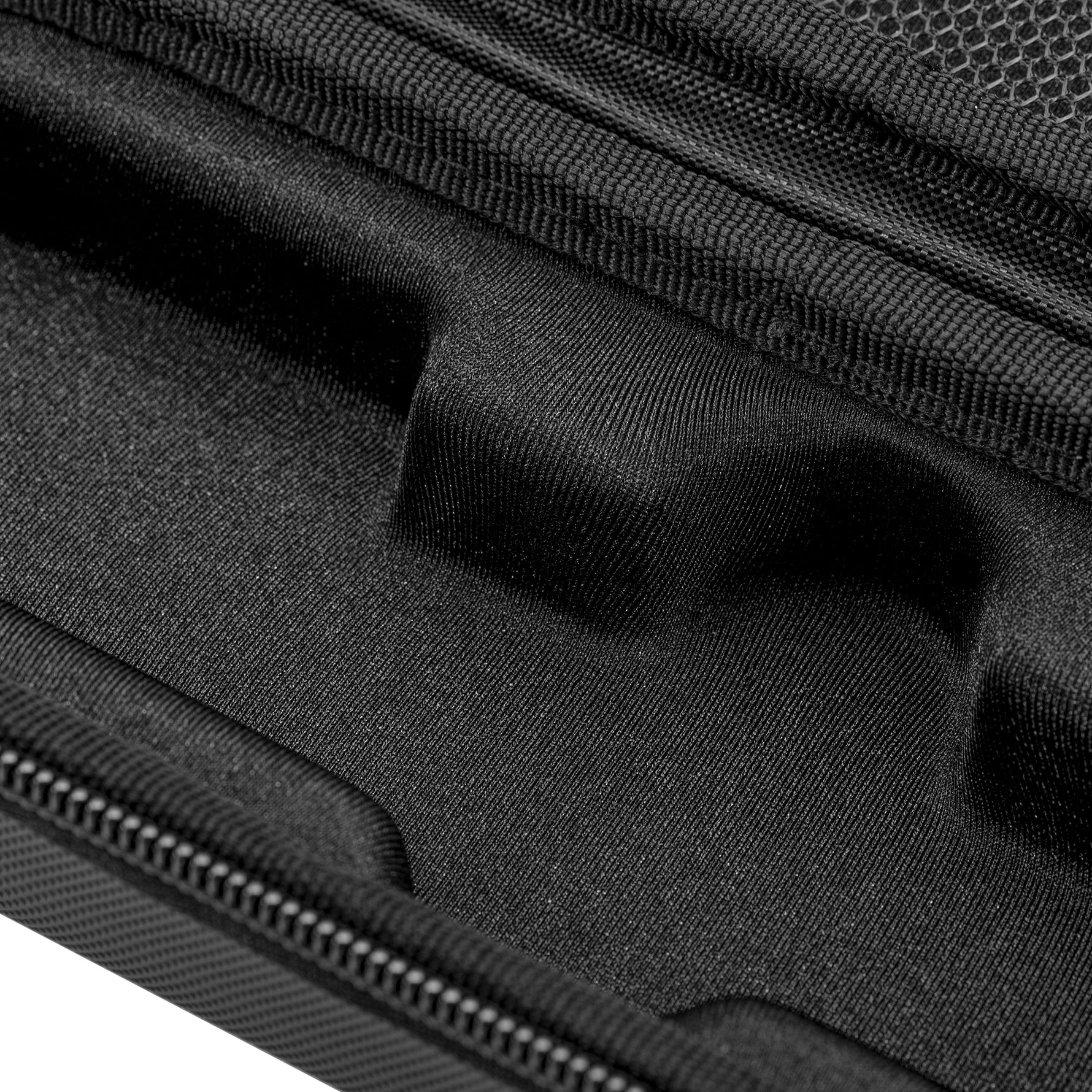A detailed close-up of the internal double-layer Lycra lining of the STARTRC DJI Osmo Pocket 4 case, showcasing its shock-proof and scratch-resistant design.