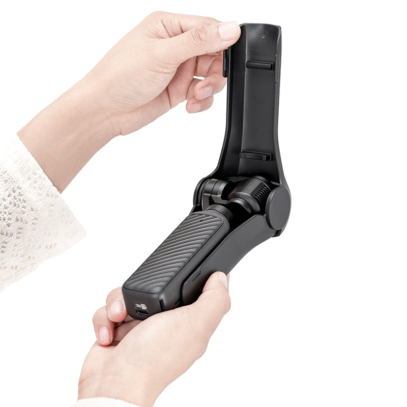 Hands opening the STARTRC Pocket 4 case using the 1-second quick-release tab, allowing for instant shooting without missing a fleeting moment.