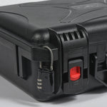 Close-up of the secure snap-lock latch and pressure valve on the waterproof drone case, ensuring maximum protection for professional aerial photography gear.