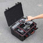 A pilot easily removing the DJI Avata 360 from the hard case without detaching the gimbal guard, ready for quick flight.
